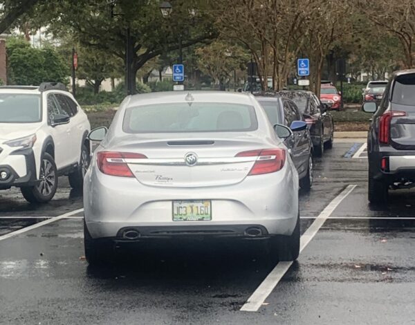 The driver of this Buick had a little trouble keeping it within the white lines at Laurel Manor Recreation Center The driver of this Buick had a little trouble keeping it within the white lines at Laurel Manor Recreation Center