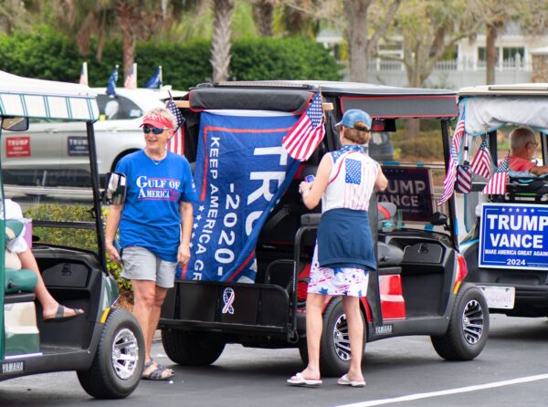 Despite the threat of stormy weather Trump fans lined up for the rally