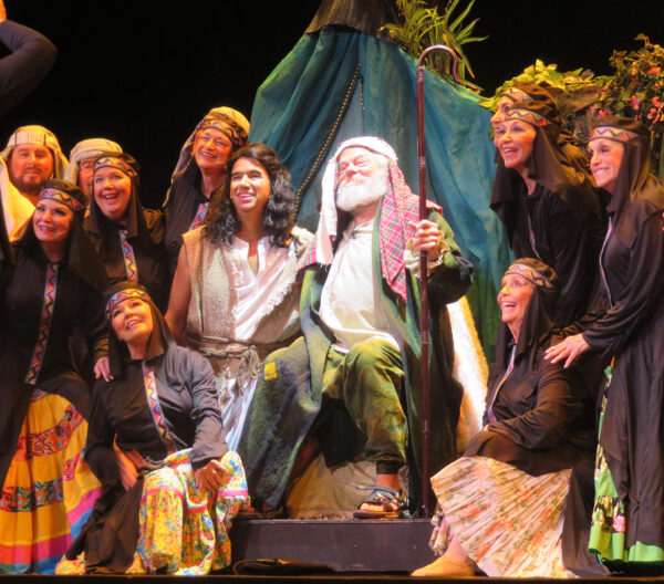 Joseph and his father played by Lon Abrams center enjoy themselves Joseph and his father played by Lon Abrams center enjoy themselves