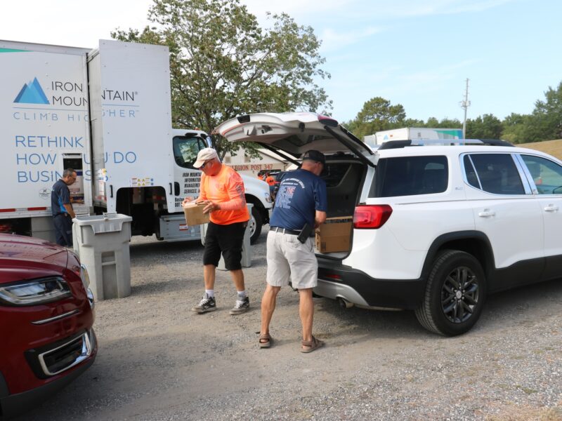 American Legion voluteers transfered docuements from resident s cars to the shreding truck Saturday morning