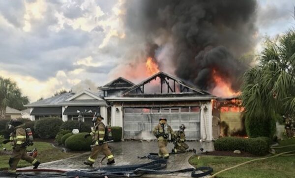 Flames were shooting from the roof of the home on Lancaster Lane in the Village of Winifred Flames were shooting from the roof of the home on Lancaster Lane in the Village of Winifred