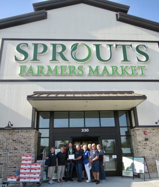 Kiwanis Club members loaded up with apples at Sprouts Farmers Market Kiwanis Club members loaded up with apples at Sprouts Farmers Market