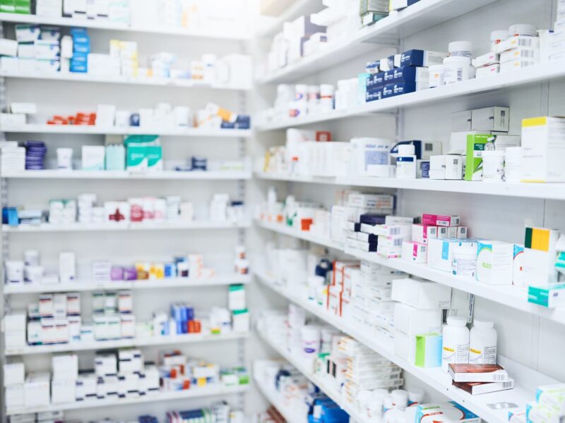 Theres something for every illness. shelves stocked with various medicinal products in a pharmacy.