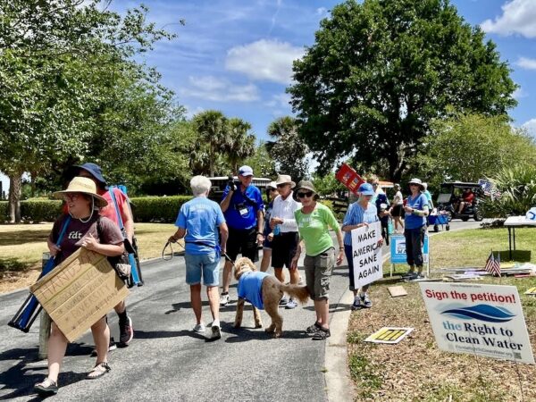The May Day rally in The Villages broke up early Thursday after complaints from Commercial Property Management The May Day rally in The Villages broke up early Thursday after complaints from Commercial Property Management