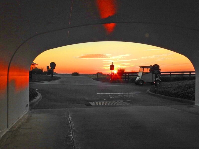 Early morning tee time at golf cart tunnel near Evans Prairie Country Club