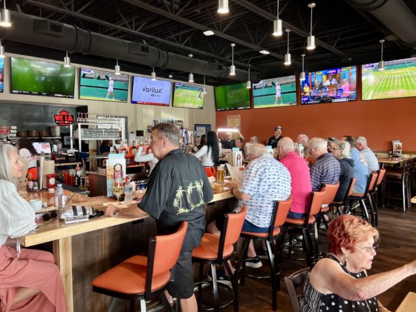 Patrons filled the bar as others sought seating in the dining area. Patrons filled the bar as others sought seating in the dining area.
