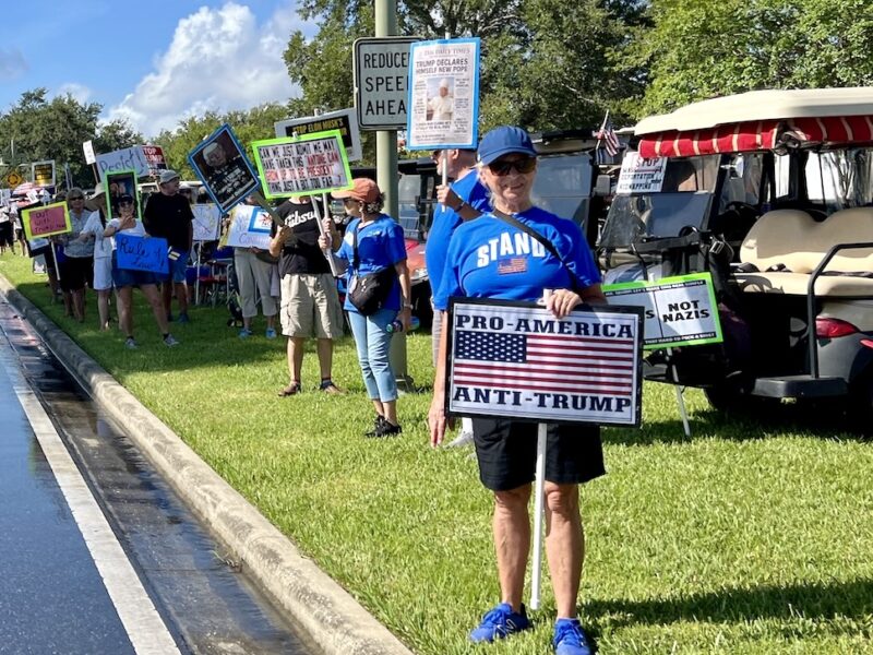 Protestors lined the road from the entrance to Lake Sumter Landing to near the intersection of Morris Boulevard and Stillwater trail in The Villages