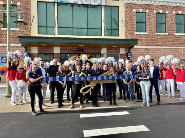 The Village Cheerleader were enthusiastic a the ALDI ribbon was cut The Village Cheerleader were enthusiastic a the ALDI ribbon was cut