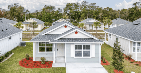 The cottage style homes would be the design used in the Habitat for Humanity complex on Rolling Acres Road