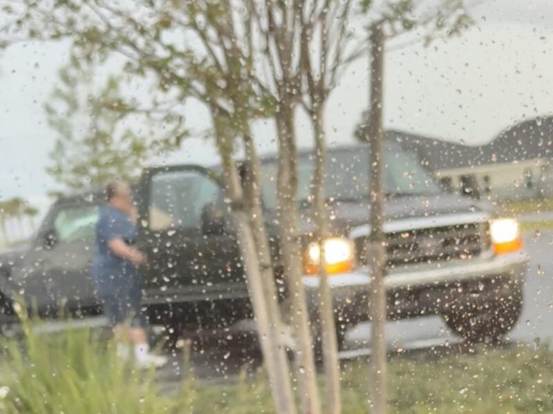 This truck was parked over four parking spaces for a mail pickup at the Waters Edge postal station