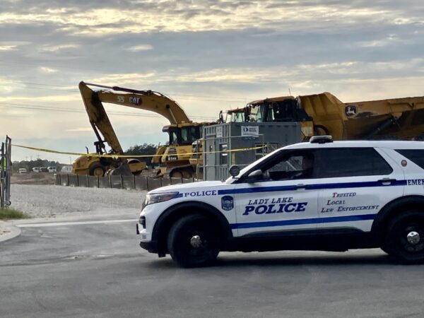 A Lady Lake police officer was among those at the scene of where the dead body was found at a construction site on County Road 466 A Lady Lake police officer was among those at the scene of where the dead body was found at a construction site on County Road 466