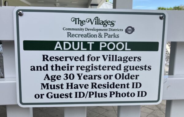 A sign at the A sign at the pool