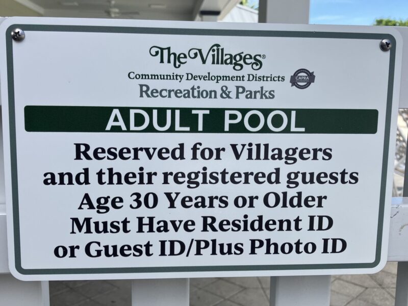 A sign at the pool
