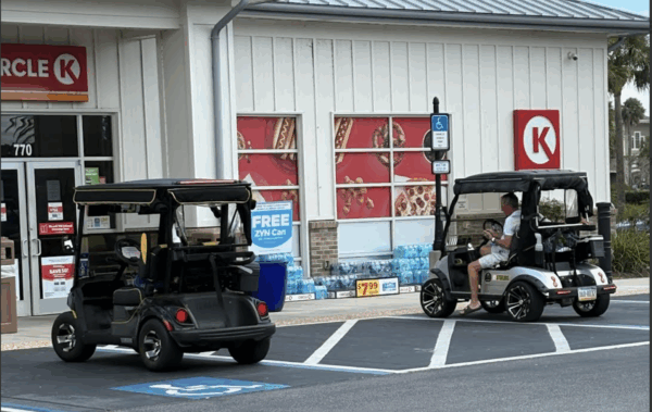 These golf carts were parked in handicapped parking at a local Circle K These golf carts were parked in handicapped parking at a local Circle K