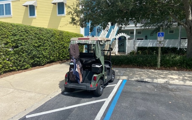 This golf cart was feeling special and opted to park in the handicapped accommodation zone at Lake Sumter Landing