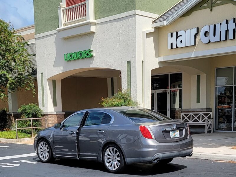 Was this motorist stopping for a quick haircut or was it a beer run?
