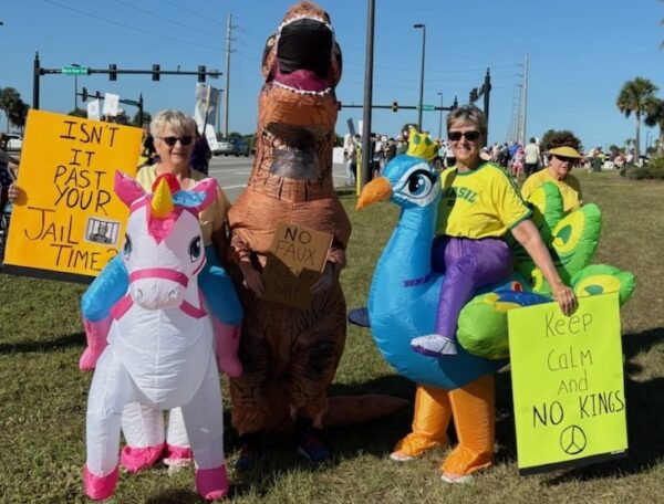Protestors near the Everglades Recreation Center wore creative costumes. Protestors near the Everglades Recreation Center wore creative costumes.