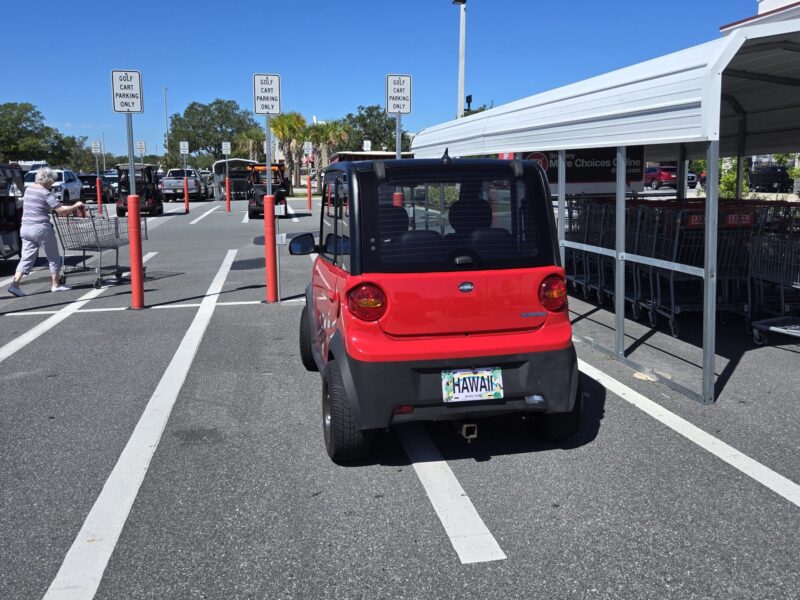 This golf cart was straddling two golf cart parking spaces at BJ s Wholesale