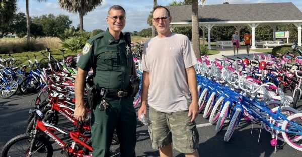 Captain Bob Siemerand Sumter Landing Bicycle Club member Frank Miller worked through out the morning getting bikes ready for Christmas Captain Bob Siemerand Sumter Landing Bicycle Club member Frank Miller worked through out the morning getting bikes ready for Christmas