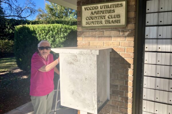 Claudia Crepeau drops a payment into the utility bill collection box at the Piedmont Postal Station Claudia Crepeau drops a payment into the utility bill collection box at the Piedmont Postal Station