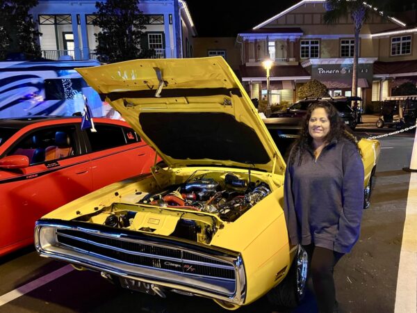 Kate Wright proudly showed her restored Charger RT during the car show.