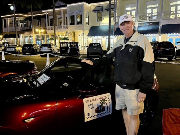 Miata Club President Mike Remsha proudly showed his 2022 Miata MX 5 during the car show at Lake Sumter Landing.