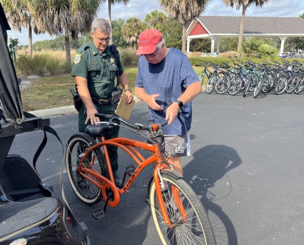 Randy Pawlowski delivered his bike by golf cart to Captain Siemer Friday morning Randy Pawlowski delivered his bike by golf cart to Captain Siemer Friday morning