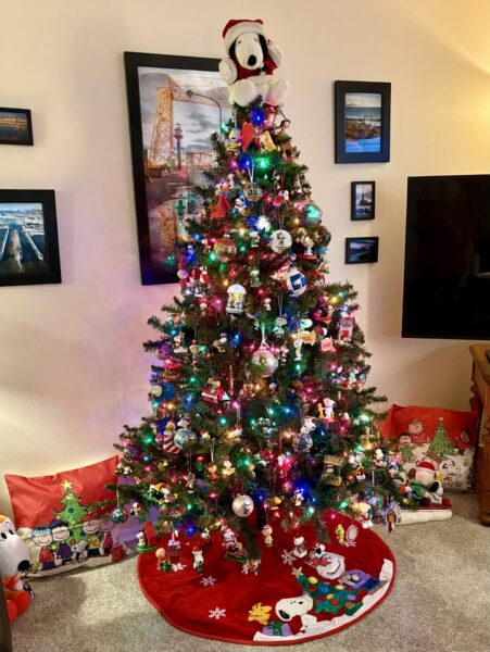 Snoopy is atop the Christmas tree