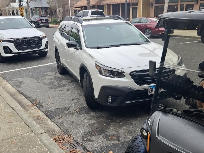 This car was far from the curb near Five Guys at Brownwood