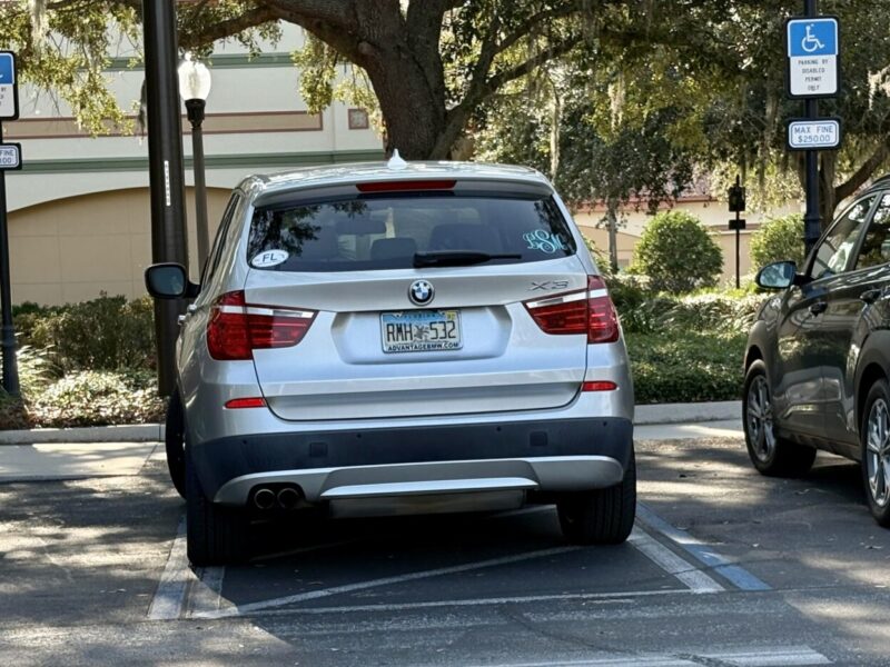 A BMW from a dealer with an Advantage enjoyed special parking in the handicapped accommodation zone