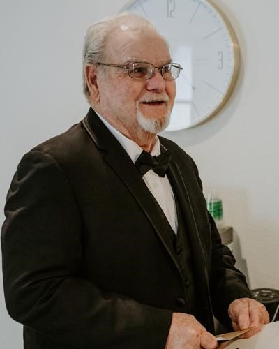 Dennis L Harvey