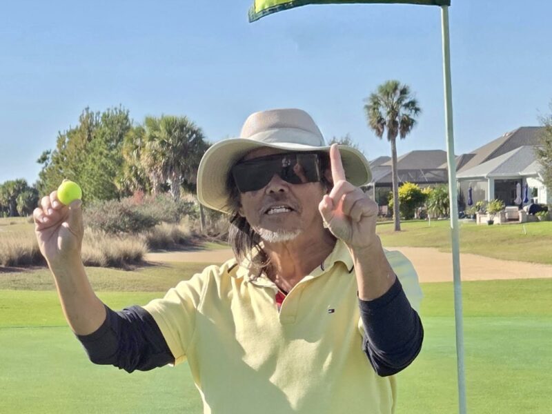 Hou syin Yu of the Village of Dabney was thrilled to score the lucky ace