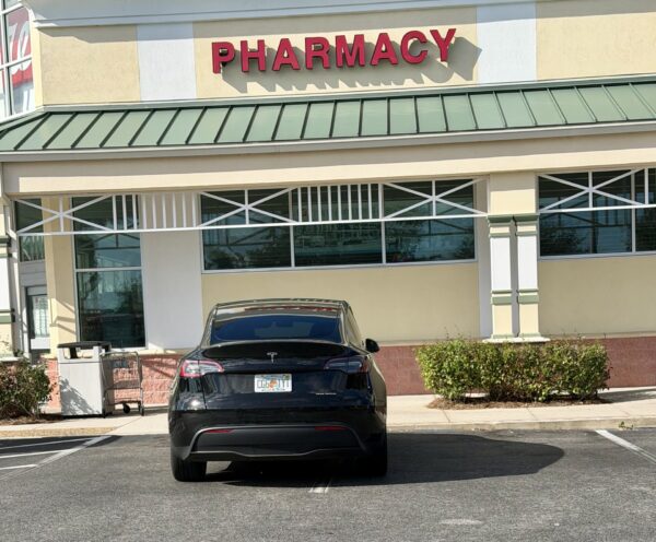This Tesla was straddling the line at a Walgreens in The Villages This Tesla was straddling the line at a Walgreens in The Villages