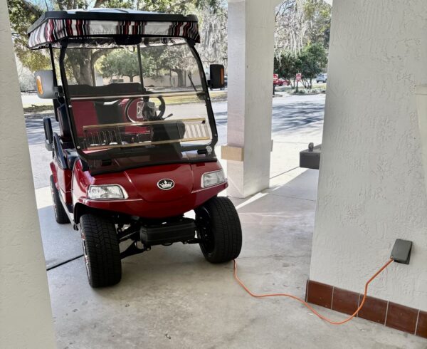 This golf cart was charging up at the De La Vista Postal Station This golf cart was charging up at the De La Vista Postal Station