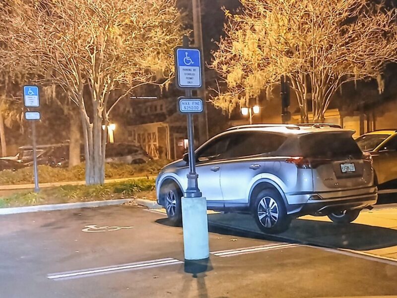 This vehicle was parked on the sidewalk near handicapped parking spaces at Brownwood