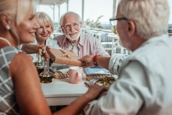 depositphotos 272074582 stock photo positive delighted mature couple having