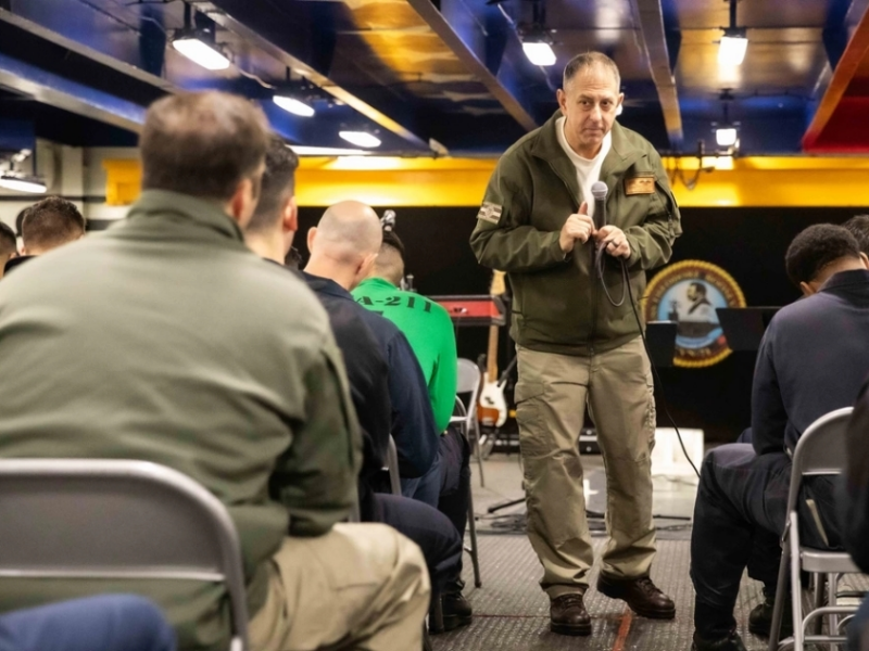 U.S. Navy Lt. Cmdr. Brian Kirschenbaum, a chaplain assigned to the Nimitz-class aircraft carrier USS Theodore Roosevelt (CVN 71), leads contemporary Christian service aboard the ship, Jan. 14, 2024.