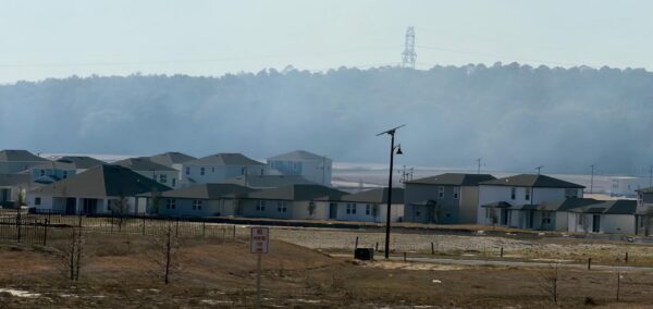 Smoke was hanging over the new homes at Hammock Oaks Smoke was hanging over the new homes at Hammock Oaks