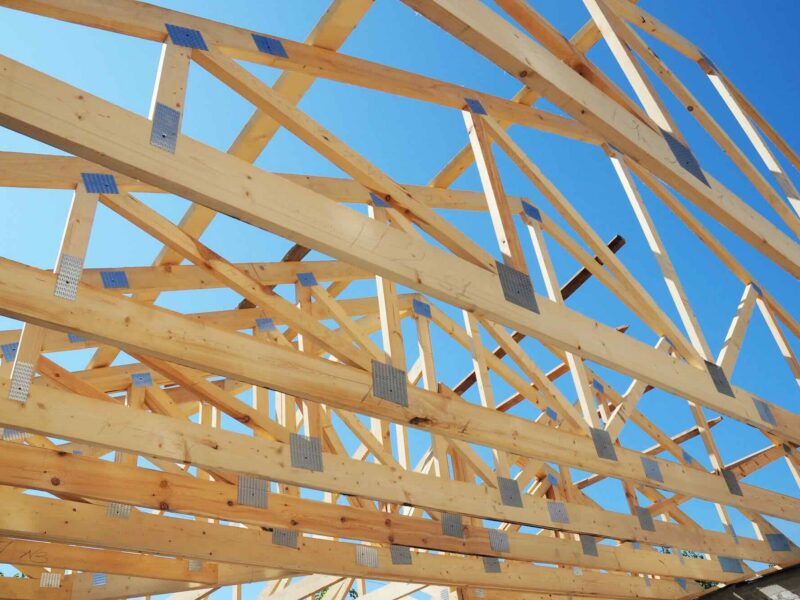 Wooden trusses at a construction site