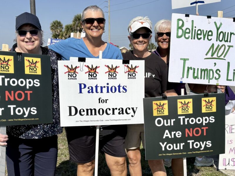 Four gals protesting