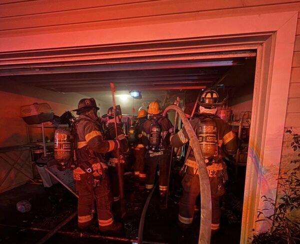 Marion County Fire Rescue firefighters in the garage. Marion County Fire Rescue firefighters in the garage.
