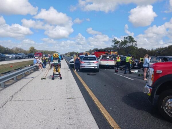 The driver of the Lincoln utility vehicle seen in the center of the photo was ticketed as a result of the crash