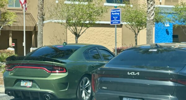 The vehicle, at left, was parked in a spot reserved for law enforcement at Walmart at Buffalo Ridge Plaza The vehicle, at left, was parked in a spot reserved for law enforcement at Walmart at Buffalo Ridge Plaza
