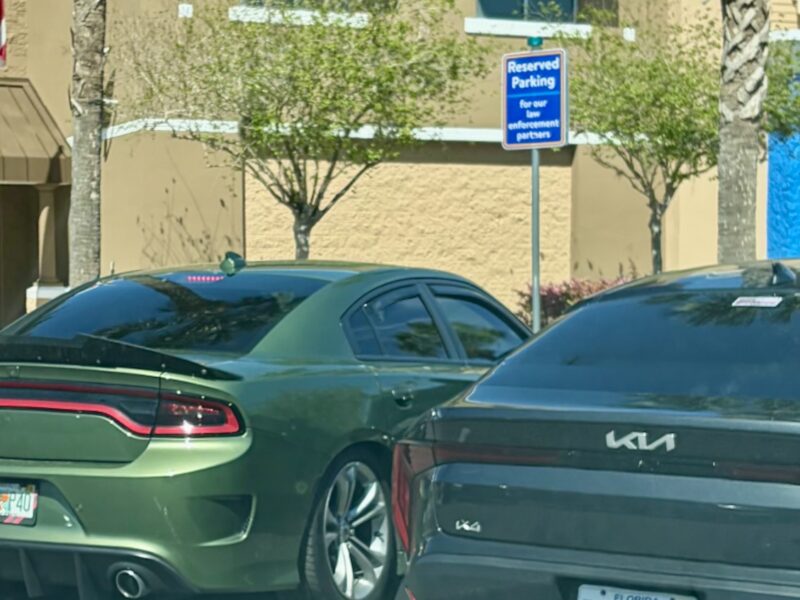The vehicle, at left, was parked in a spot reserved for law enforcement at Walmart at Buffalo Ridge Plaza