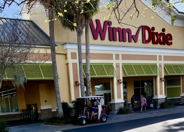 This golf cart driver had it made in the shade while waiting for his shopping partner at Winn Dixie at Pinellas Plaza in The Villages 2 This golf cart driver had it made in the shade while waiting for his shopping partner at Winn Dixie at Pinellas Plaza in The Villages 2