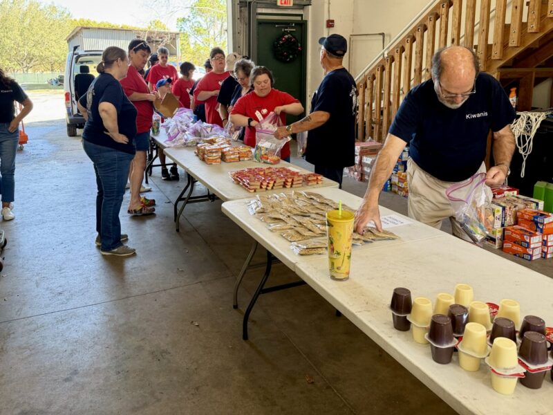 Volunteers packed bags to ensure students will have meals over spring break