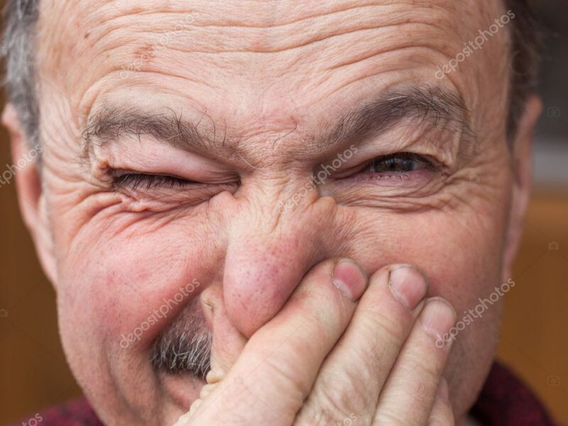 holding nose