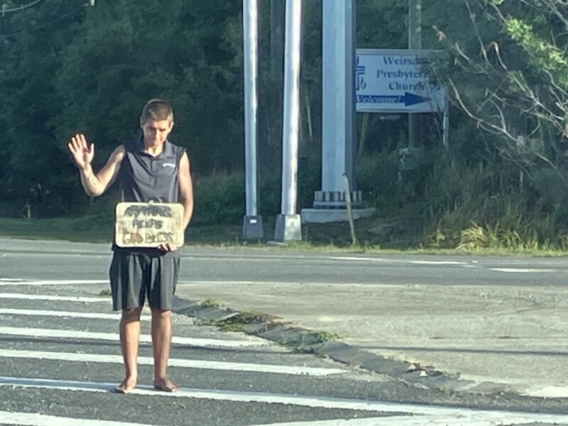 A panhandler on U.S. Hwy. 441 in Marion County