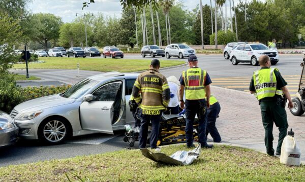 A woman as transported from the scene of the A woman as transported from the scene of the