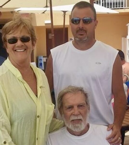 Derek Vaughn, with his mother Jerrylea and his father during a family beach vacation 2 Derek Vaugh, with his mother Jerrylea and his father during a family beach vacation 2